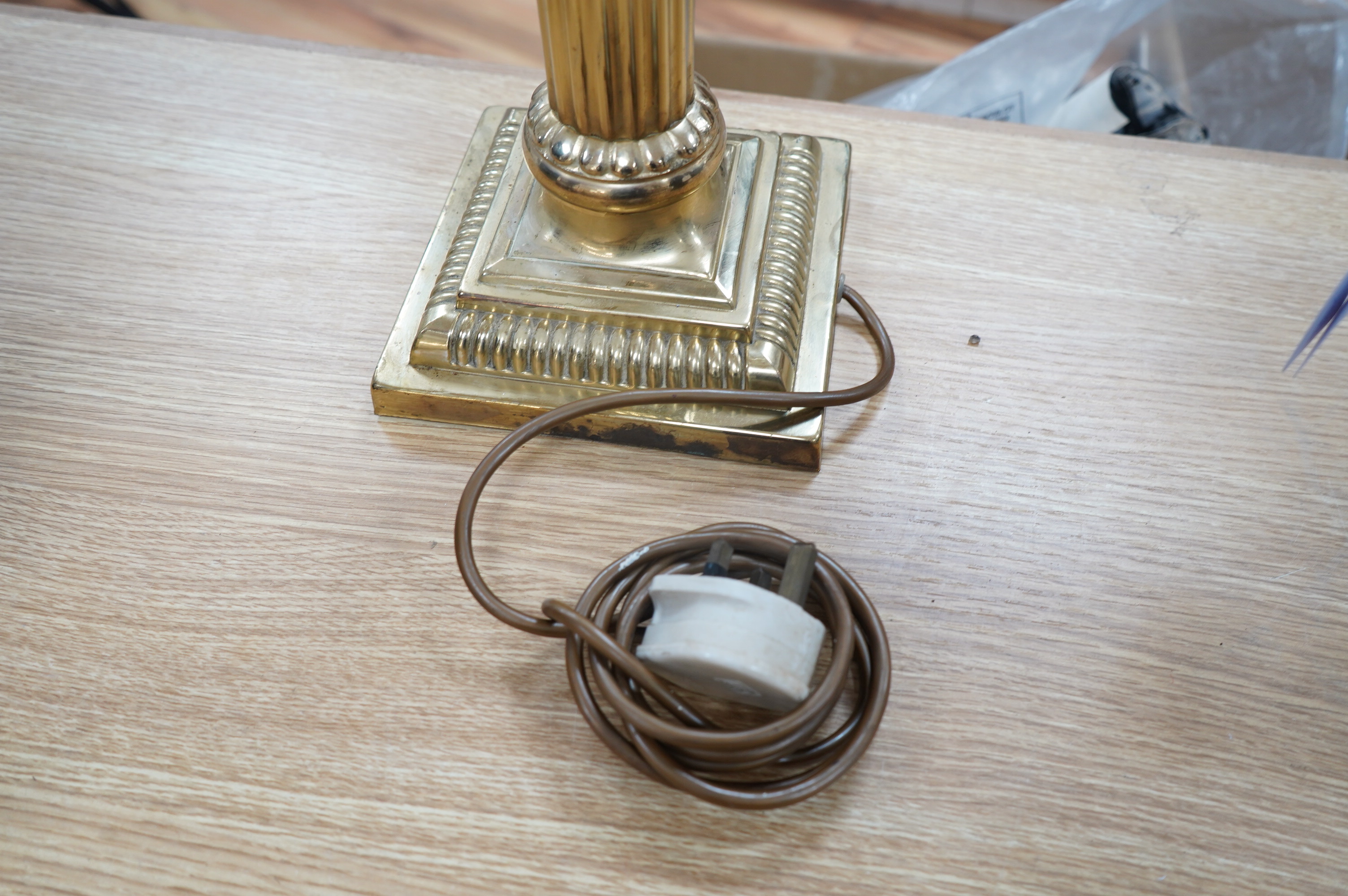 A tall brass Corinthian column table lamp with spherical glass shade, 84cm high including glass shade. Condition - good, brass tarnished at base